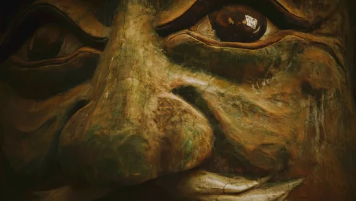 a close up of statue of a persons face