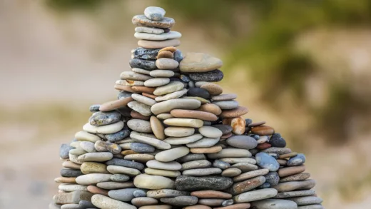 selective focus photography of stack of stones
